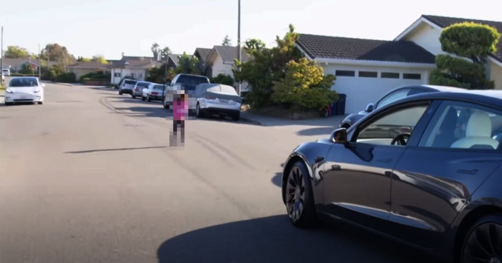 tesla-fans-put-child-in-path-of-moving-tesla-on-self-driving-mode