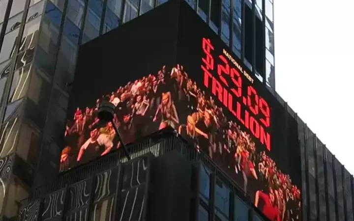 Countdown Chaos: Times Square Billboard Sounds Alarm on $34 Trillion National Debt