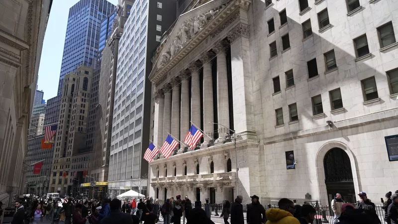 Wall Street Rises as US Jobs Report Surprises Investors